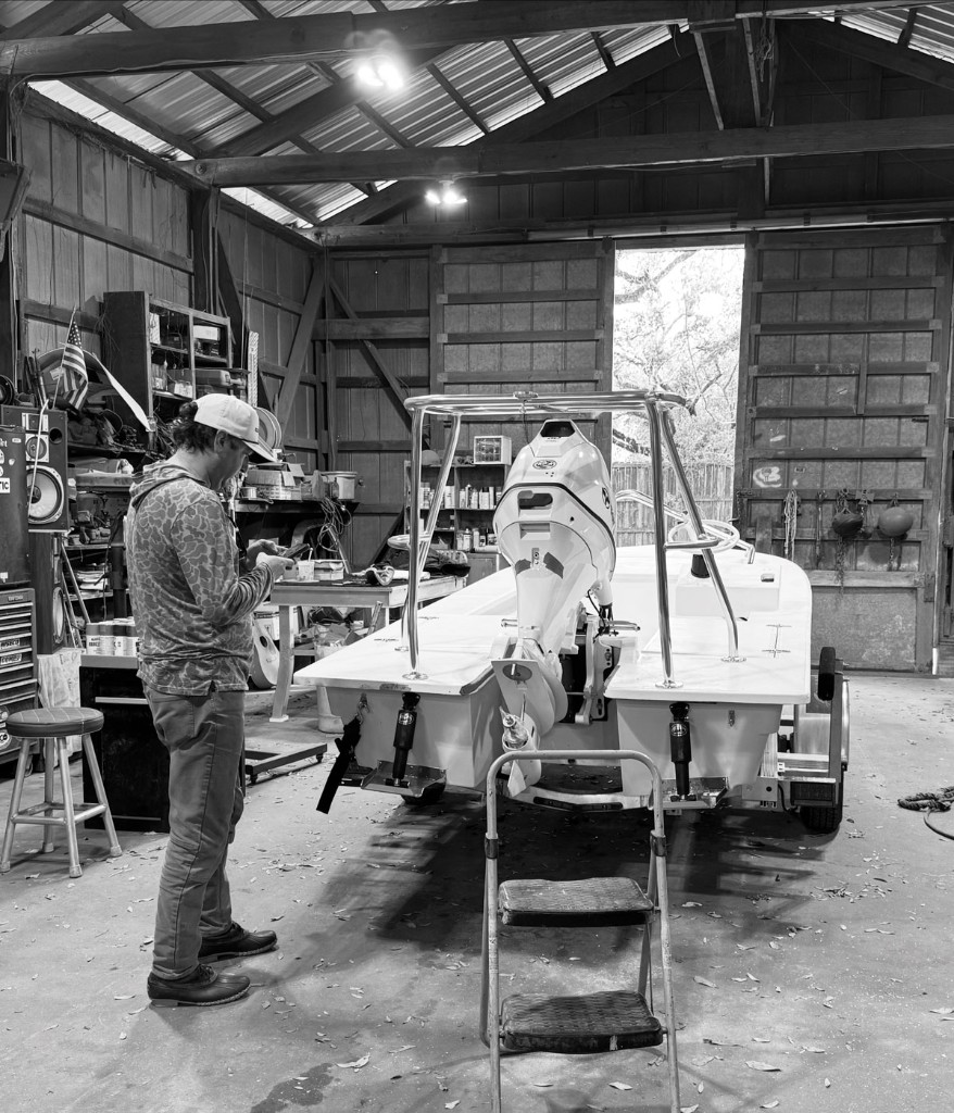 Lancha 18 being rigged in the shop